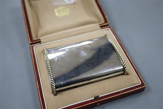 A George VI Cartier silver and yellow metal mounted cigarette case, in original fitted Cartier gilt tooled leather box.